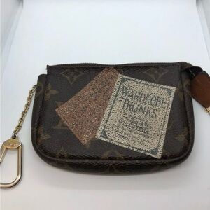 Limited edition Louis Vuitton Monogram Trunks Pochette Cles SUPER RARE ITEM
